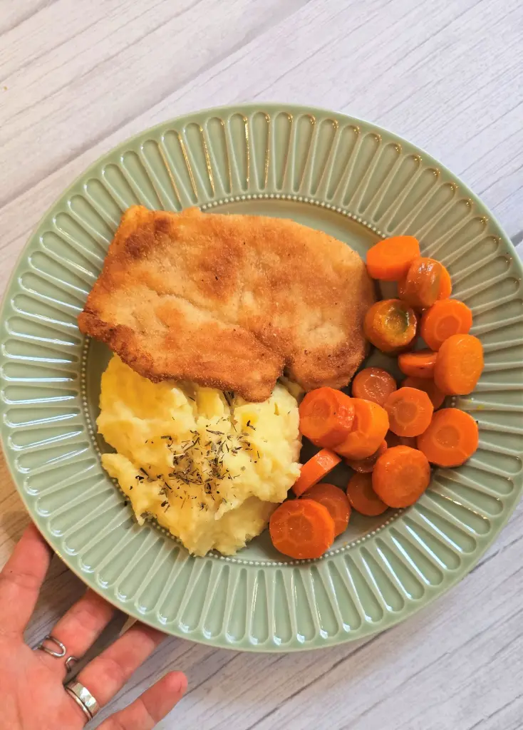 Milanese-style escalope with roasted carrots and parsnip purée